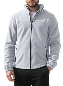 Detail of light gray fleece jacket featuring a stand collar and high-quality zipper pockets