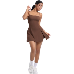 Brown athletic dress featuring thin straps and side slit detail for tennis or yoga