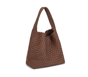 Detail shot of brown hand-woven neoprene texture on a spacious waterproof hobo bag