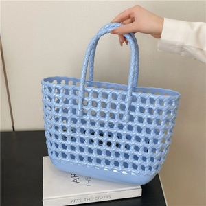 Blue hollow woven jelly basket bag for summer beach travel and daily vacation use
