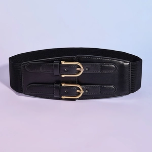 Detail of black elastic wide waist belt with double golden buckles and faux leather finish
