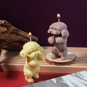 Standing teddy dog scented candles in yellow and purple with realistic fur texture