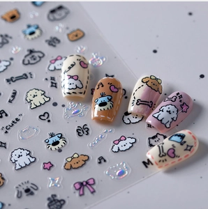 Detail of laser cartoon nail stickers with puppy and heart patterns for DIY manicure