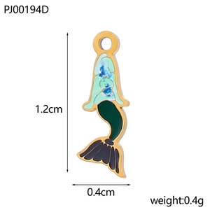 Detail view of a small blue mermaid tail charm in gold-plated stainless steel for DIY jewelry