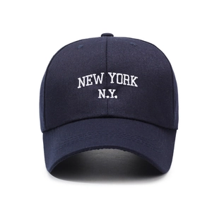 Navy blue cotton baseball cap with New York embroidery and a curved visor for outdoor sun protection