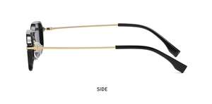 Seitenansicht der Vintage-Sonnenbrille mit schwarzem Rahmen und goldenen Metallbügeln