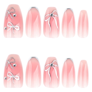 Pink gradient press-on nails with silver bow, rhinestones and French tip ballet design