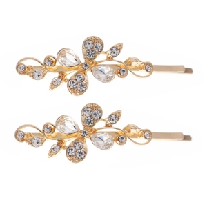 Golden flower and butterfly hair clips set with sparkling rhinestones on white background