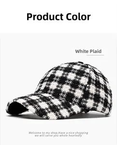 Detail of the high-quality black and white houndstooth fabric on this warm winter baseball cap
