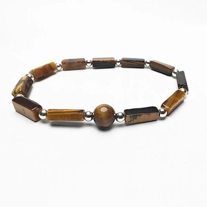Close-up of natural Tiger Eye stone bracelet with rectangular beads and silver spacers