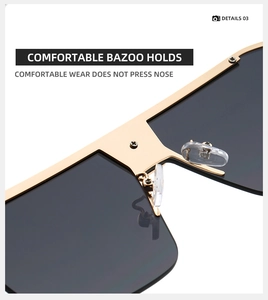 Primer plano detallado del puente de metal dorado y almohadillas nasales para gafas de sol