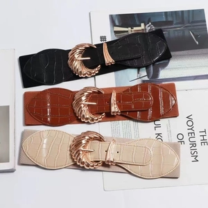Detailed comparison of wide elastic waist belts with shell-pattern gold metal buckles