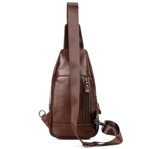 Back view of brown genuine leather men's chest bag with zipper pocket and metal buckle