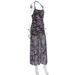 Detail of rose print mesh dress showing halter neck tie and gathered waist texture