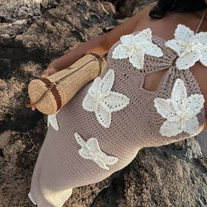 Boho halter crochet maxi dress with floral appliqué and hollow knit for summer beach vacation