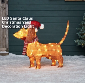 Close-up of lighted LED dachshund outdoor figure with festive Santa hat and striped scarf