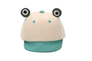 Detail of baby frog baseball cap showing 3D eyes and breathable cotton twill fabric
