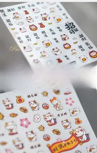 Autocollants 3D pour ongles du Nouvel An avec chat porte-bonheur et lingots d'or