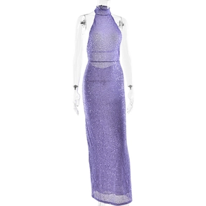 Detail of purple sequined halter dress featuring a sheer fabric and backless design