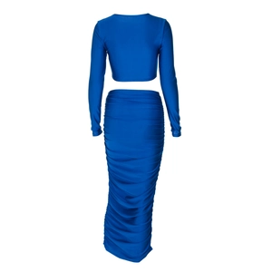 Dettagli del completo blu reale due pezzi con top corto a maniche lunghe e gonna a pieghe
