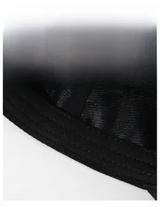 Detail of the widened sweatband and breathable mesh fabric on a black baseball cap