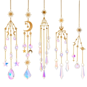 Set of 5 celestial suncatchers with gold sun and moon motifs and rainbow crystal prisms