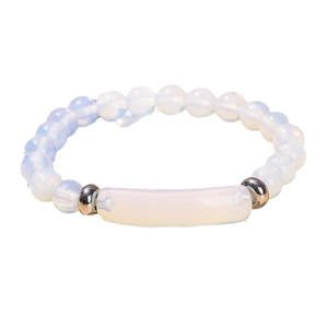 Minimalist white moonstone beaded bracelet featuring a central bar and silver spacers