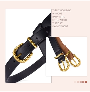 Detailed close-up of golden bamboo buckle on black and brown PU leather belts for women