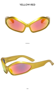 Detail view of Y2K retro sunglasses featuring golden frames and red gradient lenses