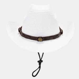 Detail of white straw cowboy hat showing brown leather band and metallic accents
