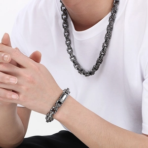 Retro hammered texture titanium steel necklace and bracelet set worn by male model