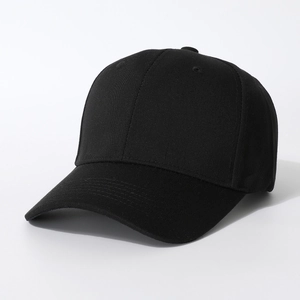 Detail view of the black cotton twill baseball cap with embroidered eyelets and top button