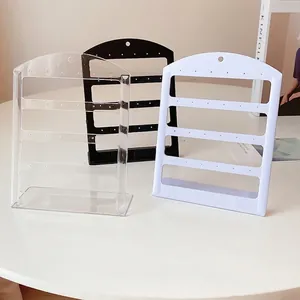 L-shaped acrylic earring display stand organizer with four tiers in black white and clear