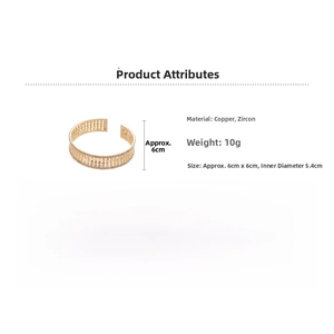 Detailed view of gold multi-layer open bangle with cubic zirconia and mesh design