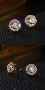 Detailed views of round halo stud earrings featuring rose gold plating and zircon stones