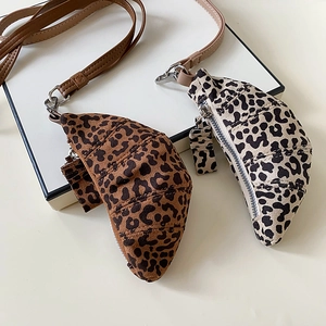 Close-up of leopard print croissant coin purse necklace with metal zipper and leather strap