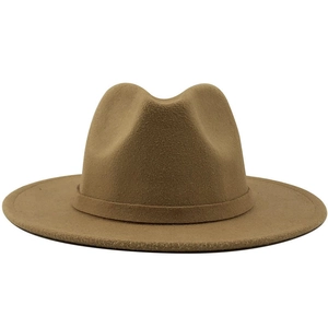 Detailed view of light brown wool fedora hat with classic flat brim and top indentation