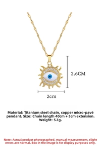 Macro view of gold devil eye sun pendant with detailed size and weight measurements