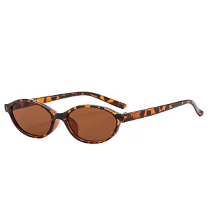 Retro oval tortoiseshell sunglasses with brown lenses and plastic hinge for women