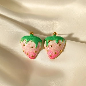 Pink and green strawberry stud earrings in gold plated stainless steel on silk