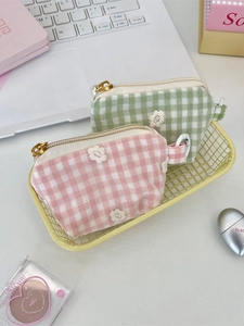 Mini daisy plaid coin pouches in pink and green colors on a bright aesthetic desktop