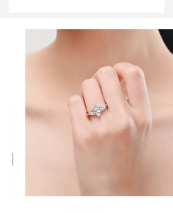 Close-up of s925 silver ring with five marquise-cut zircons in a floral setting