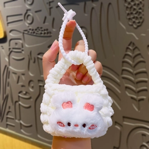 Cute white knit rabbit-style earphone case with pink ears and plush carry handle