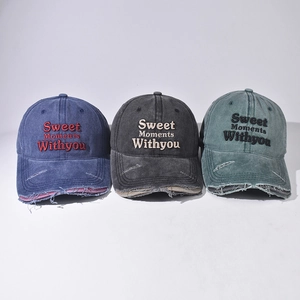 Vintage washed baseball caps with Sweet Moments embroidery and distressed brim details