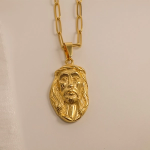 Gold Jesus head pendant with thorns on paperclip chain necklace in high-detail metal finish