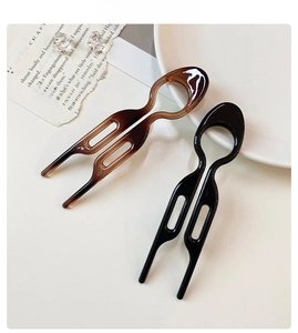 U-shaped hair pin set in amber brown and black colors for elegant bun hairstyles