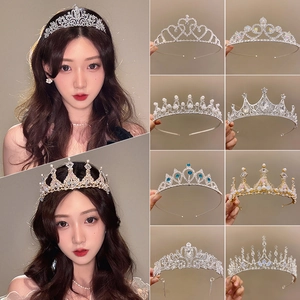 Elegant princess crown headband with crystals and pearls for bridal or birthday occasions