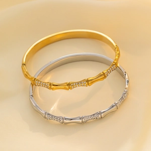 Bamboo shaped gold and silver bracelets with sparkling micro-pave cubic zirconia crystals