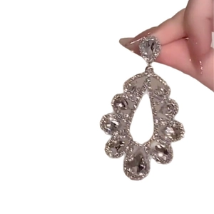 Elegant silver waterdrop hollow earrings with pavé crystals for luxury weddings