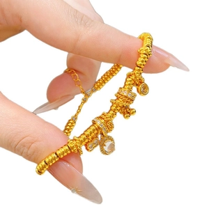 24k gold plated twisted link bracelet with heart charms and sparkling zircon stones